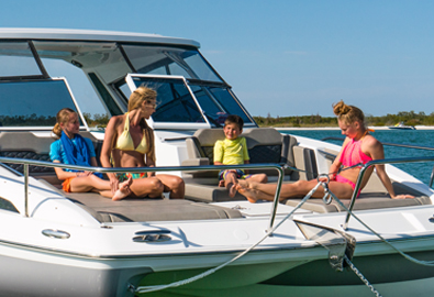 family on bow of MarineMax 362