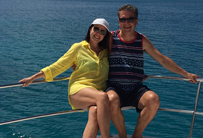 Couple on bow of boat