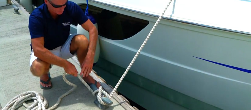 Man tying dock lines