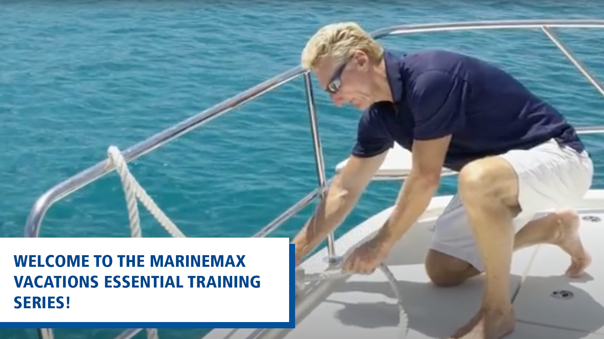 man tying rope on boat