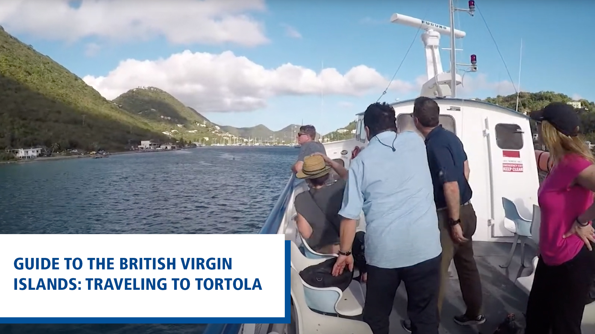 back view of people on a boat going to Tortola