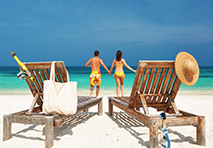 couple enjoying beach in cayman islands