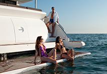 people relaxing aboard a yacht