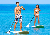 couple paddleboarding