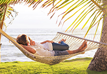 couple relaxing on hammock in south florida