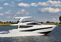 galeon yacht cruising through water