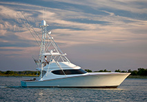 hatteras gt yacht slowly cruising through water