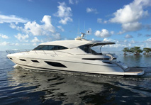 riviera yacht cruising through water