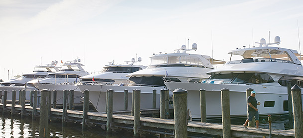Yachts lined up in a marina
