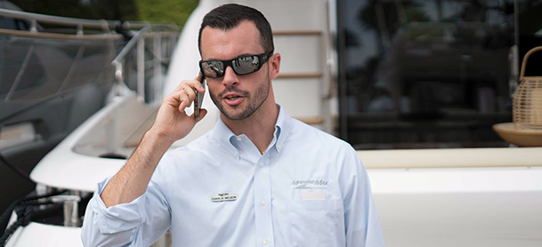 Yacht broker on cell phone