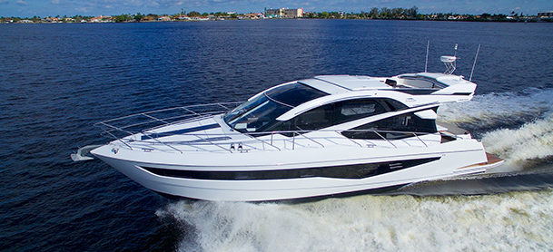 Yacht racing along water