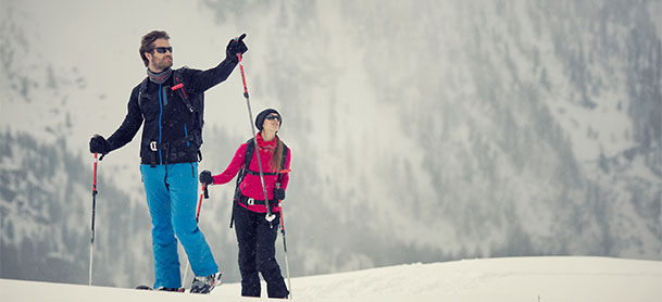 Man and woman hiking.