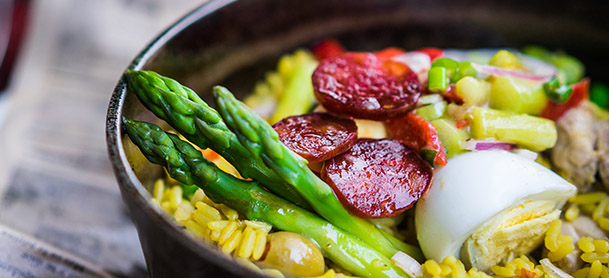 bowl of paella with vegetables
