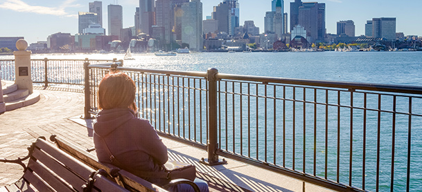 Sitting by the Charles River in Boston