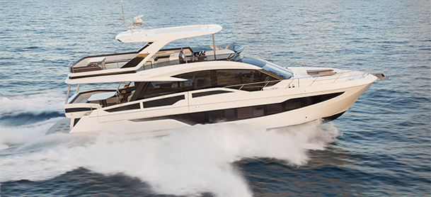 Galeon 640 FLY yacht cruising through blue water