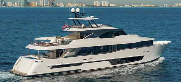 Ocean Alexander 37L in the water with buildings in the background