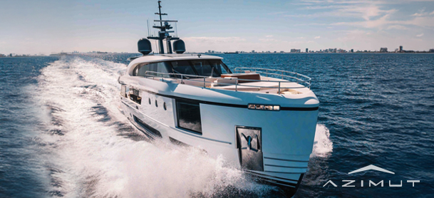 Luxurious white Azimut yacht cruising through calm blue waters under a clear sky, leaving a foamy trail.