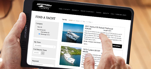 Browsing yachts on tablet