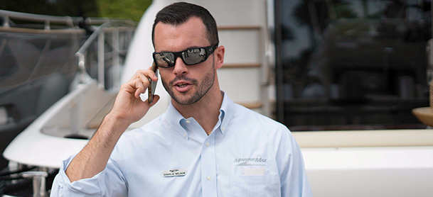 Yacht broker on cell phone