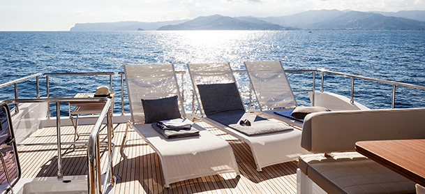 chairs on the aft deck of a yacht