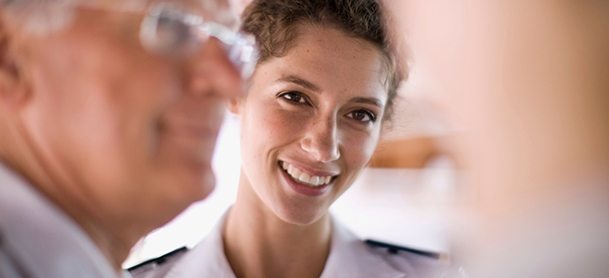man and woman in uniform
