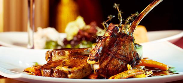 chef created meal on a white plate