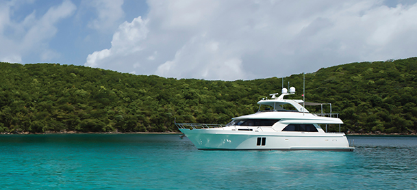 large white yacht on teal waters