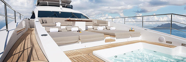 bow view of superyacht showing seating and hot tub
