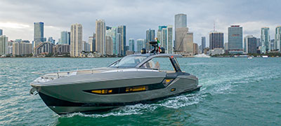 Azimut model in the water with city skyline in the background