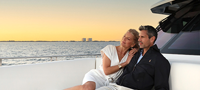 man and women lounging on a yacht