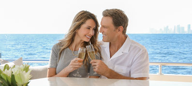 man and a women on a yacht