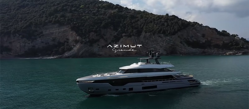 Azimut grande trideck in water in front of cliff