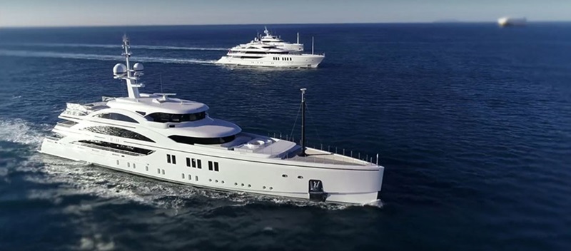 two large white Benetti yachts on the water