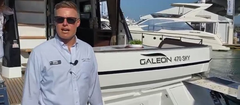 A man in front of a Galeon 470 SKY Yacht