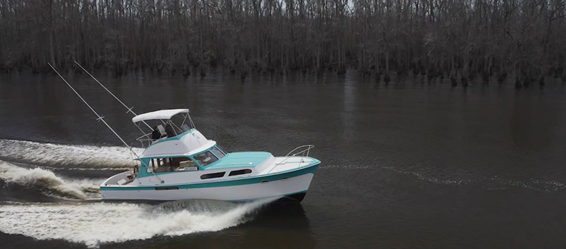 A Hatteras yacht in the water