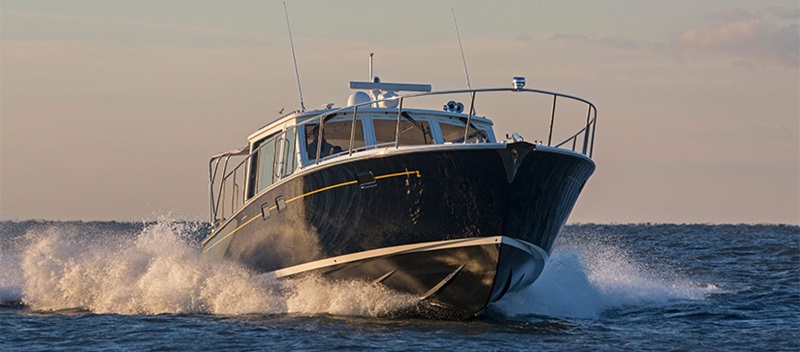 MJM Yachts 50z cruising bow first and making waves
