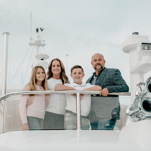 brandon flaherty and his family on a yacht