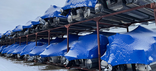 Wrapped boats sit in a MarineMax marina